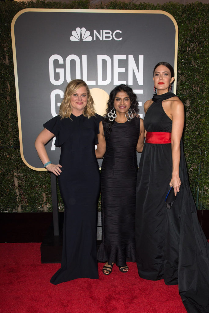 Amy Poehler, Saru Jayaraman and Mandy Moore arrive at the 75th Annual Golden Globe Awards Red Carpet